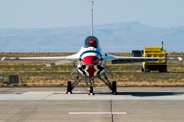 Lockheed F-16 Fighting Falcon (91-0392) - Thunderbird #5 sitting idle on the flight line before performing at Gunfighter Skies 2014. Full Quality Photo: a rel=nofollow href=http://www.airliners.net/photo/USA---Air/Lockheed-F-16CM-Fighting/2523628/L/&sid=8af27326c0c5be330f7a2c6fe5efc620http://www.airliners.net/photo/USA---Air/Lockheed-F-16CM-Fighting/2523628/L/&sid=8af27326c0c5be330f7a2c6fe5efc620/a