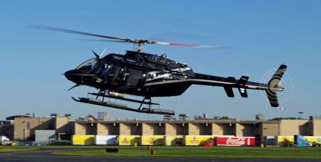 Bell 407 (N403TD) - LINDEN, NEW JERSEY, USA-SEPTEMBER 03, 2019: Seen at Linden Airport preparing to land and refuel was this commercial Bell helicopter operated for the Blade company.