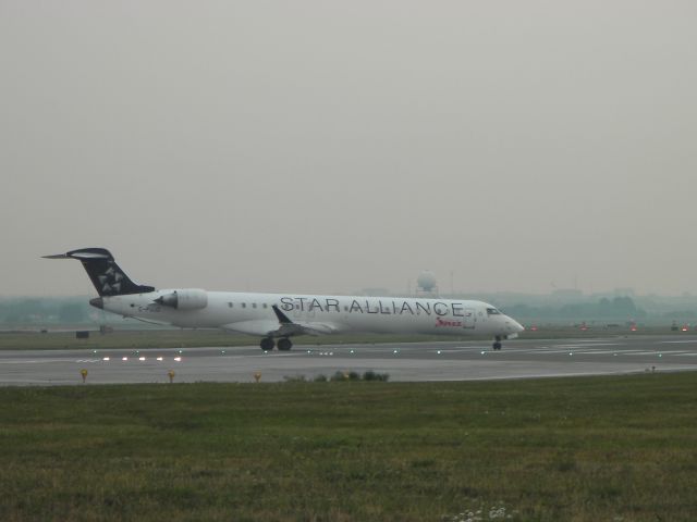 Canadair Regional Jet CRJ-700 (C-FUJZ) - Takeoff from Runway 23