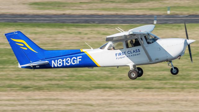 Cessna Skyhawk (N813GF) - N813GF climbing out of Martin State Airport's runway 15 while doing pattern work 