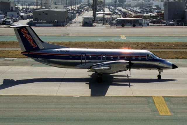 Embraer EMB-120 Brasilia (N188SW) - Taxiing to depart rwy 24L on 25-Jun-02.  Exported to Angola 17-May-06 where it became D2-EDE for Airjet.