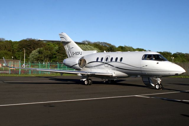 Hawker 800 (G-SCPJ) - Saxon Air Hawker 900XP parked on the ramp on 13-May-18 recently arrived from EGNT as SXN80K.