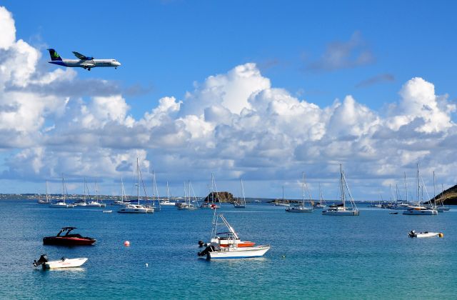 ATR ATR-72 — - Standing on the beach of Grand Case Village, St. Martin. 