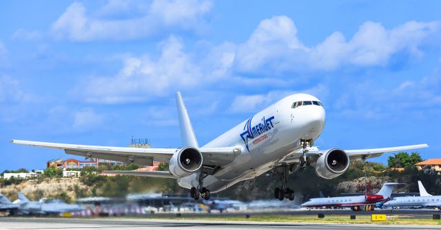 BOEING 767-300 (N373CM) - Amerijet Boeing 767-300 heavy N373CM departing TNCM St. Maarten onward to the next short stop laden with ordered goods from the USA.