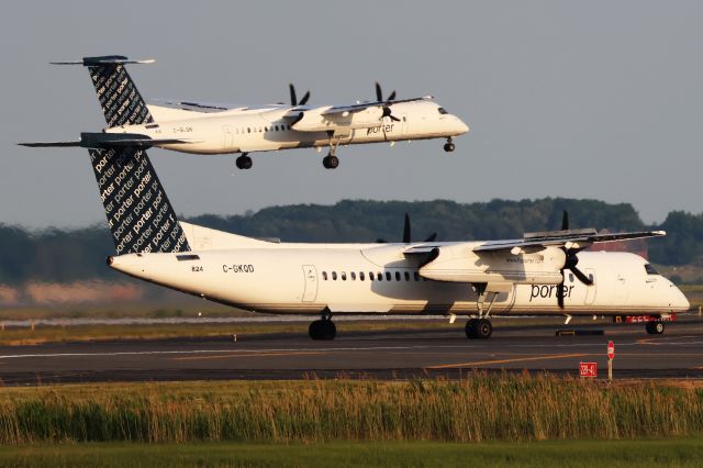 de Havilland Dash 8-400 (C-GKQD) - One Porter departing BOS while another arrives.