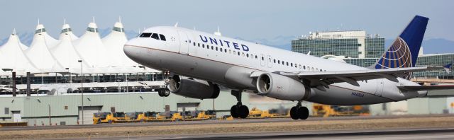 Airbus A320 (N443UA) - Departing from 17R.