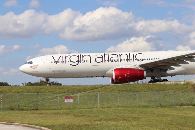 Airbus A330-300 (G-VINE) - 10/15/22 taxi in on Juliet from Rwy 35R