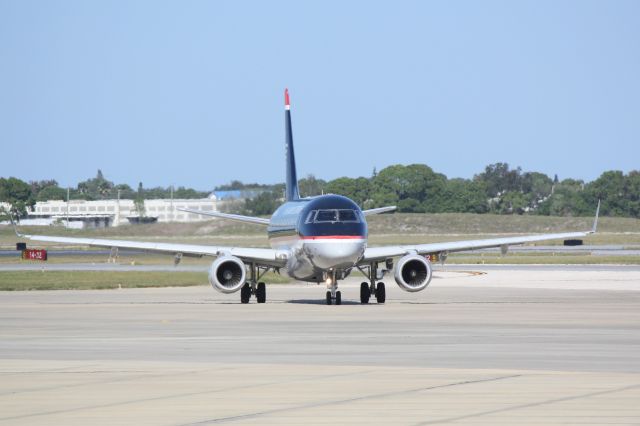 Embraer 170/175 (N801MD) - Republic Airlines/US Airways Express Flight 3399 pulls into gate following arrival to Sarasota-Bradenton International Airport