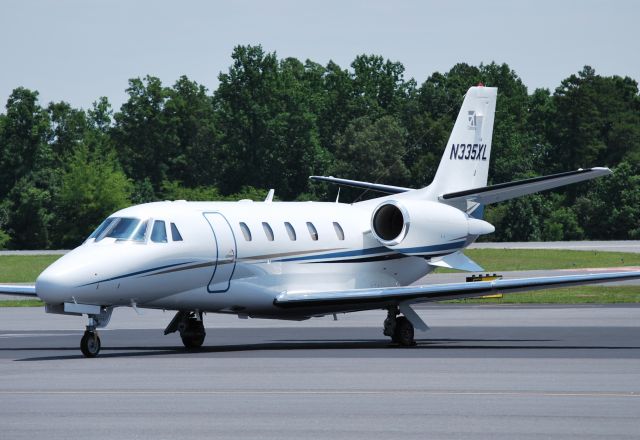 Cessna Citation Excel/XLS (N335XL) - CESSNA AIRCRAFT COMPANY (NASCAR Stewart Haas Racing) at KJQF - 7/16/14