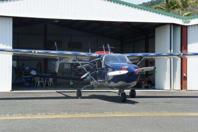 Cessna Super Skymaster (VH-OIQ) - Outside Hangar 2, Southern hangars, Cairns. VH-PIQ in background.