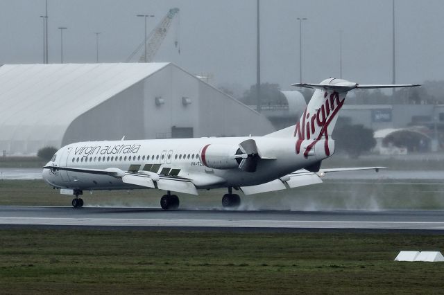 Fokker 100 (VH-FZO) - Fokker 100 cn 11305 Virgin Australia Regional VH-FZO Barrens Beach wet short final rwy 03 YPPH 14 July 2018