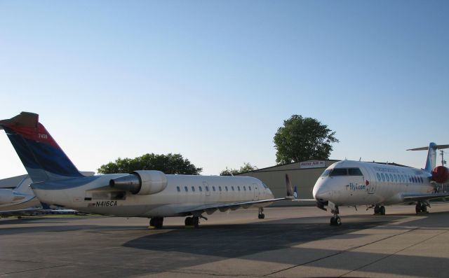 Canadair Regional Jet CRJ-100 (N416CA) - A gagel of CRJs at the Emery CRJ Maintenance facility at RFD