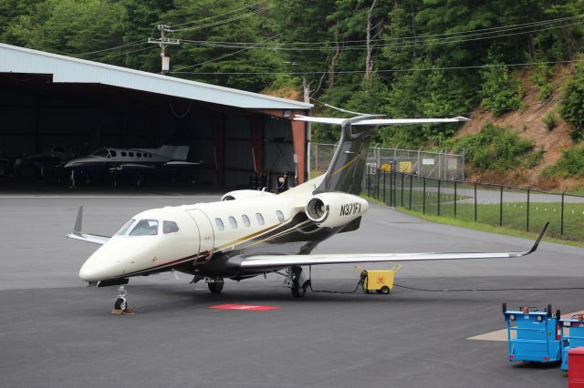 Embraer Phenom 300 (N371FX) - Parked br /operated By: Flight Options