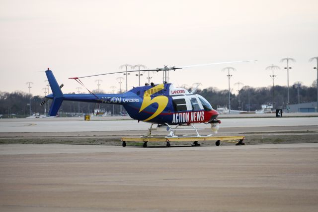 Bell JetRanger (N5QV) - 5 ACTION NEWS a BELL 206B sits on the ramp at the Memphis International Airport. 