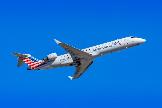 Canadair Regional Jet CRJ-700 (N713SK) - A SkyWest CRJ700 taking off from PHX on 3/4/23. Taken with a Canon R7 and Canon EF 100-400 L II lens.