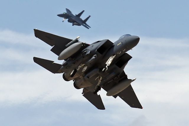 McDonnell Douglas F-15 Eagle — - A pair of Strike Eagles on approach to Nellis AFB, Nv