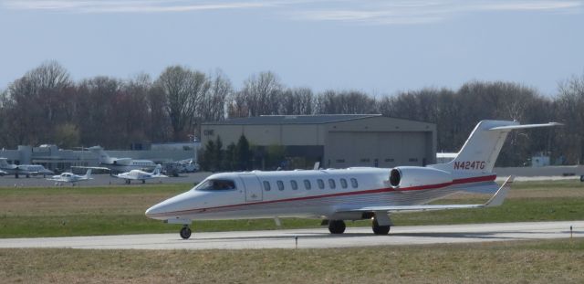 Learjet 45 (N424TJ) - Taxiing to departure is this 2001 Learjet 45 in the Spring of 2021.