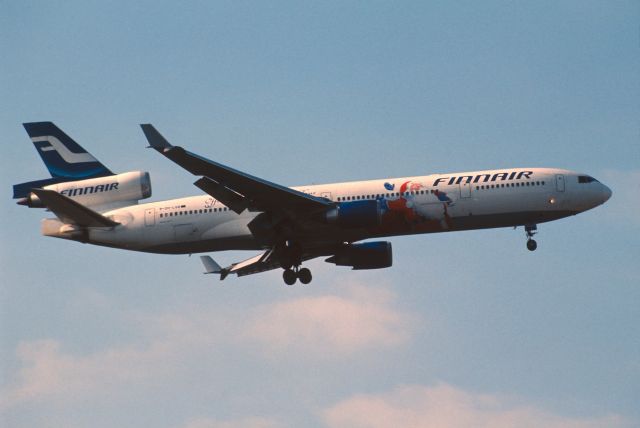 Boeing MD-11 (OH-LGB) - Final Approach to Narita Intl Airport Rwy34L on 2005/11/13 " Santa Claus c/s "