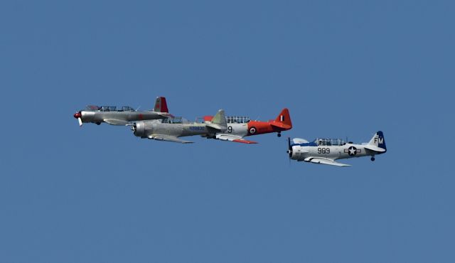 — — - 3 SNJ's and a CJ-6 in a fly over commemorating a bridge dedicated to veterans and first responders in Rockwall, Texas 02 Oct 2020.