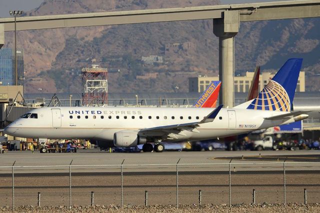 Embraer 170/175 (N119SY) - United Express Embraer ERJ170-200LR N119SY at Phoenix Sky Harbor on December 20, 2015. It is operated by Skywest Airlines. It first flew as PR-EHL. Its construction number is 17000421. It was delivered to Skywest on September 18, 2014. 