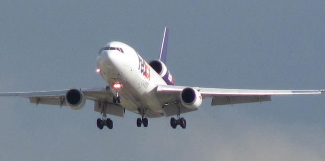 McDonnell Douglas DC-10 (N319FE) - MD-10 landing on 34R