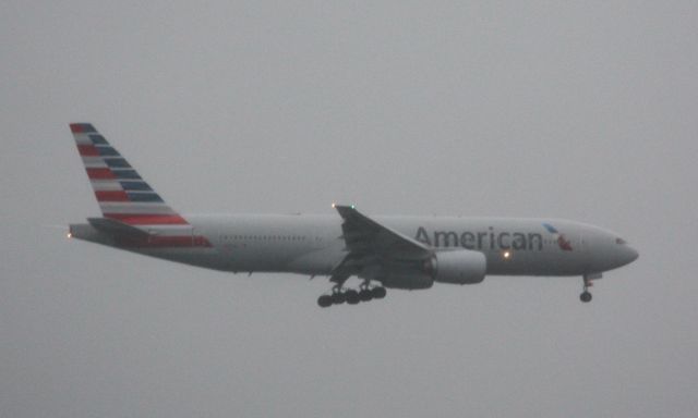 Boeing 777-200 (N787AL) - This AA B772 was a sub for usual B738 on Chicago OHare flight. Plane arrived in heavy rain/wind. 