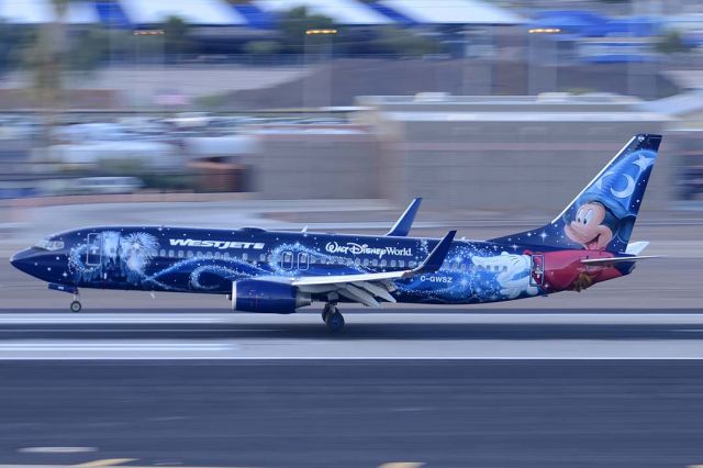 Boeing 737-800 (C-GWSZ) - Westjet 737-8CT C-GWSZ Magic Plane landing at Phoenix Sky Harbor International Airport on April 5, 2015.