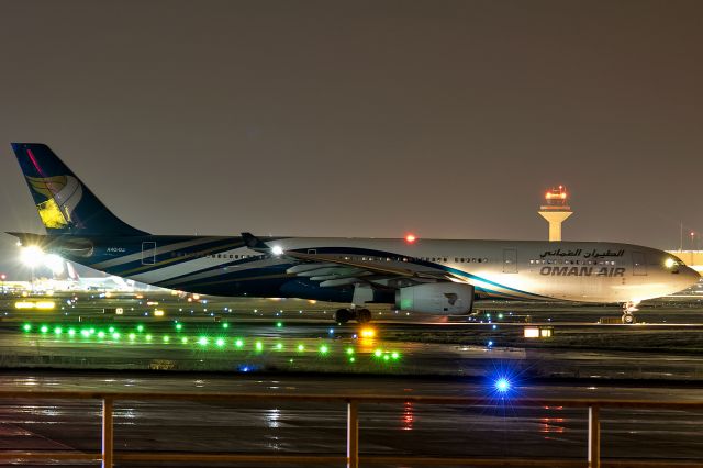 Airbus A330-300 (A4O-DJ) - with a little bit rain in Frankfurt. Taken in absolute darkness