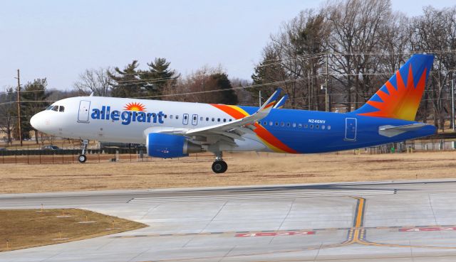 Airbus A320 (N246NV) - Allegiant 662 KSFB-KLEX floats gracefully to touchdown on runway 22 at Lexingtons Bluegrass Airport.