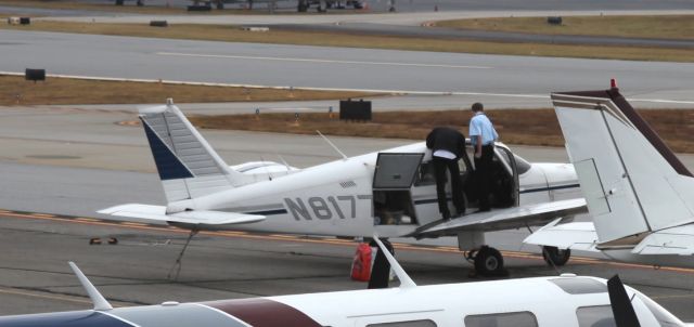 Piper Cherokee (N8177) - Partial tail number, loading for the trip