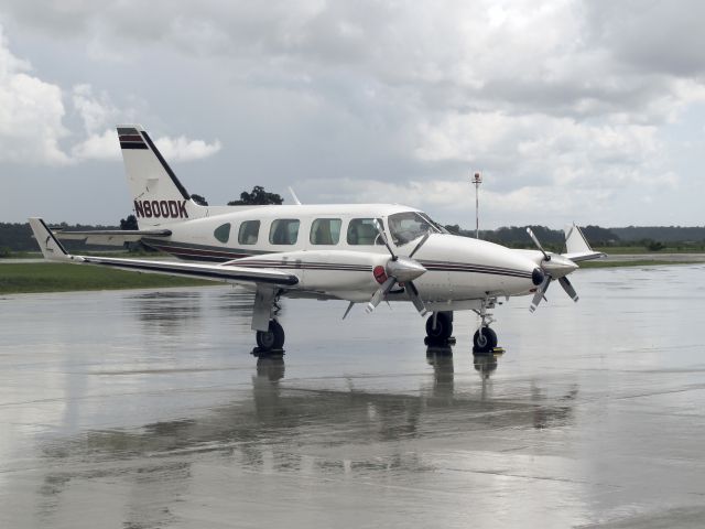 Piper Navajo (N800DK) - Note the 4-bladed props.