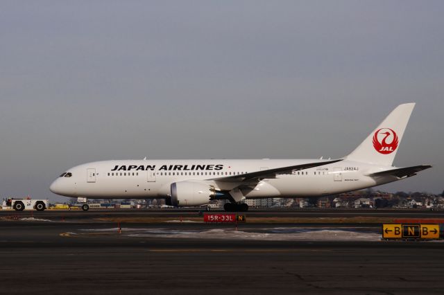 Boeing 787-8 (JA824J) - under tow by GSI back to the gate !