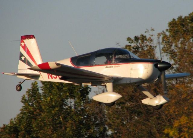 Beechcraft Bonanza (33) (N5682L) - Doing touch and goes on 14 at Downtown Shreveport. Grumman Yankee.