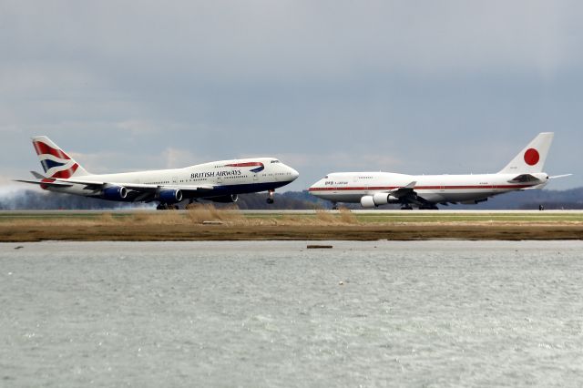 Boeing 747-400 (20-1102) - Speedbird 213 from London touching down past the taxiing Japan Air Force 002 Heavy. The second of the Japanese PMs 747s to depart.