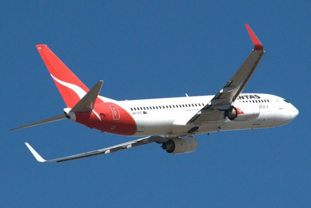 Boeing 737-800 (VH-VYC) - Heading skywards off runway 23. Thursday 4th April 2013.