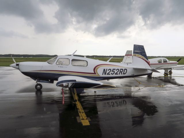 Mooney M-20 (N252RD) - Gathering for the Mooney arrival at Oshkosh. 18 August 2015.