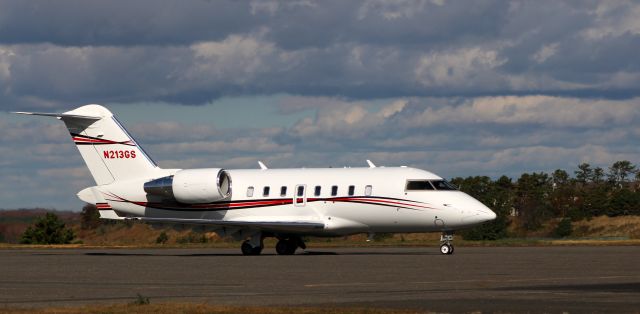 Canadair Challenger (N213GS) - Taxiing to parking is this 2014 Canadair Bombardier Challenger 605 in the Autumn of 2021.