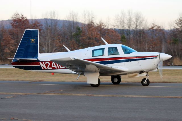 Mooney M-20 (N241LW) - Mooney 1LW taxiing to the transient parking on December 4, 2013.