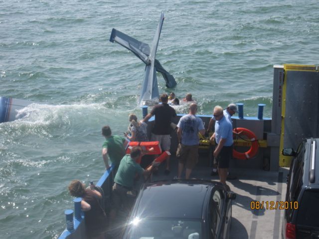 Cessna T210 Turbo Centurion (N14AW) - sinking after ditching into Lake Erie