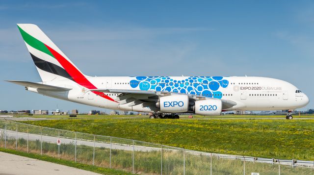 Airbus A380-800 (A6-EOF) - On the occasion of YYZ having 3 Emirates A380's on the ground at the same time (a first!), this rescue bird lines up on runway 06L to take stranded pax back to Dubai. The previous day's return flight lost it's number 2 engine about an hour into the flight home, turned around near Montreal and landed safely back at YYZ. A rescue bird was dispatched from Dubai (pictured here) and arrived the following morning along with the regularly scheduled 380. To top it off, Emirates SkyCargo sent us a 777F with the new engine and a crew of 20 for the installation. Later in the week a Cargolux 747 operating for Emirates ferried the damaged engine to London. 