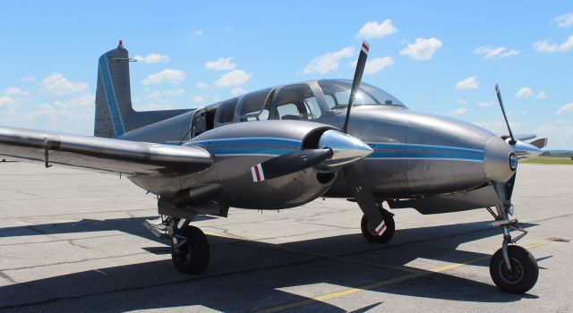 N536D — - A 1962 model Beechcraft D50E Twin Bonanza on the ramp at Northwest Alabama Regional Airport, Muscle Shoals, AL - June 13, 2020.