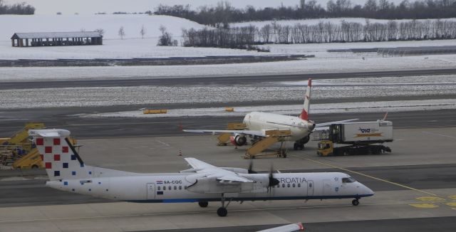 de Havilland Dash 8-400 (9A-CQC) - 12/7/23 taxiing in to a hard stand