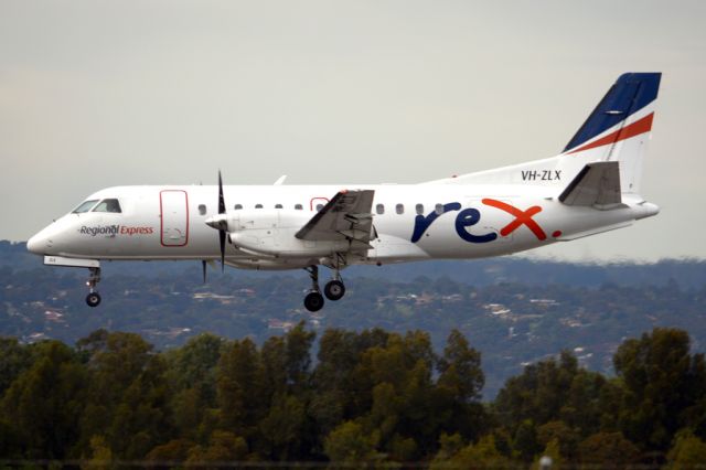 Saab 340 (VH-ZLX) - On short finals for runway 05. Thursday, 19 June 2014.