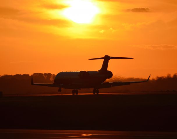 Canadair Regional Jet CRJ-700 (N605QX) - A cool sunset arrival on 23L.