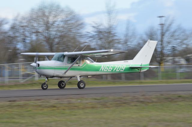 Cessna Commuter (N66709) - Infinite Air Center's Cessna 150 working the pattern on Runway 34.