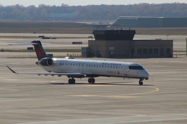 Canadair Regional Jet CRJ-900 (C-GCJZ) - C-GCJZ taxing at KDTW after landing on October 23rd, 2022.