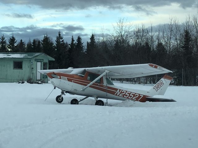 Cessna 152 (N25527) - Nice looking little Cessna 152 with its original factory paint job parked at the Merrill Field Camp Ground. Snow load on the wings and tail are pushing the tail down and nose up. 