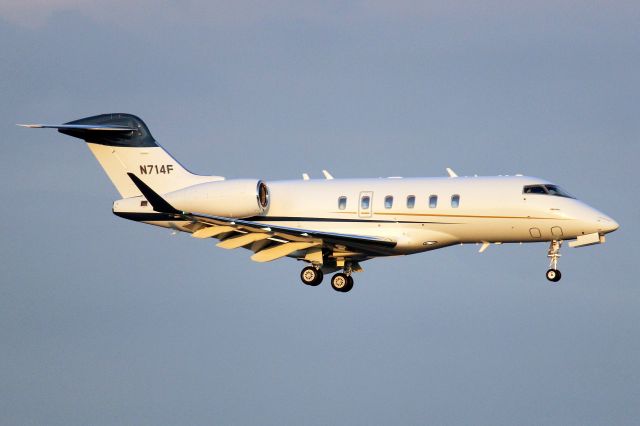 Bombardier Challenger 300 (N714F) - On short finals for rwy 18R on 17-Oct-22 arriving from KFMY.