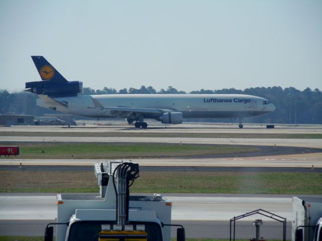 Boeing MD-11 (D-ALCF) - A Lufthansa Cargo MD-11 reverses its engines after touching down in Atlanta after a long flight from Frankfurt, Germany.