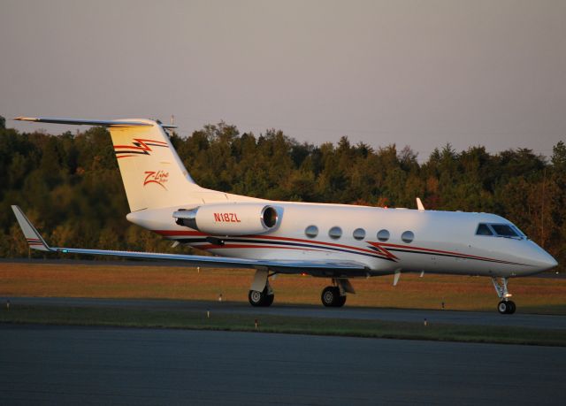 — — - Z LINE DESIGNS INC - Kyle Buschs Nationwide Series sponsor arriving for the Friday night race at Charlotte Motor Speedway. Helicopter N2175J will soon land beside it on the ramp to take its passengers to the speedway. - 10/15/10